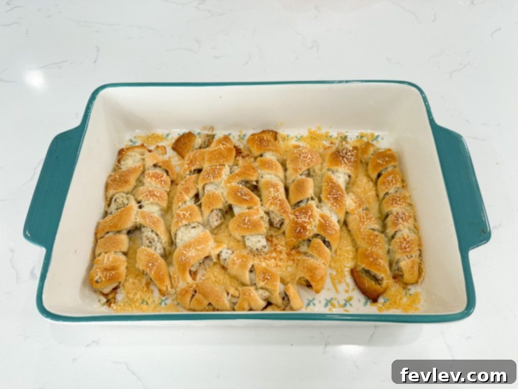 Golden Crescent Chicken with Sun-Dried Tomato Cream 9 Golden baked chicken wrapped in crescent dough, drizzled with creamy sun-dried tomato sauce