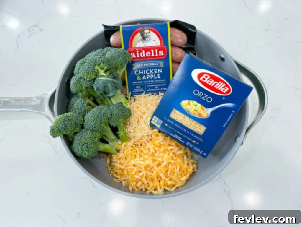 Delicious One-Pot Chicken Sausage Orzo Skillet with tender broccoli florets, perfect for a quick and easy weeknight dinner.