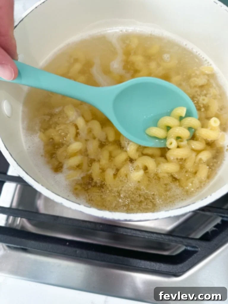 Preparing the ingredients for the Chicken Mozzarella Pasta, highlighting the ease of the process