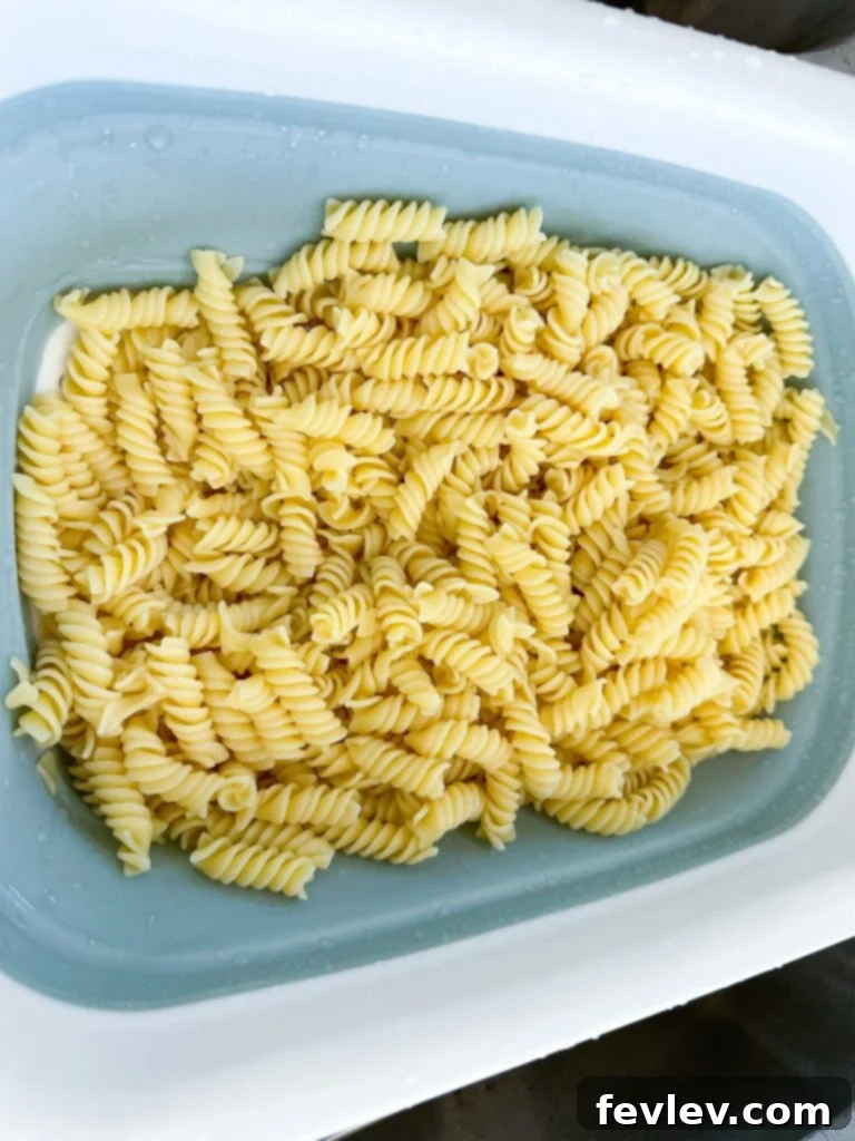 Nacho Taco Pasta Crunch 7 Cooked rotini pasta, perfectly cooled and ready for the salad.