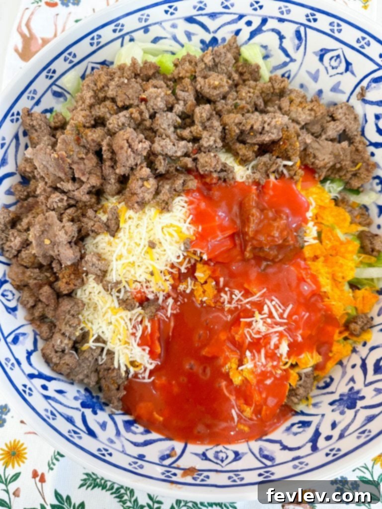 Catalina Doritos Taco Salad 5 A bowl of drained and rinsed chili beans, ready to be added to the flavorful taco salad.