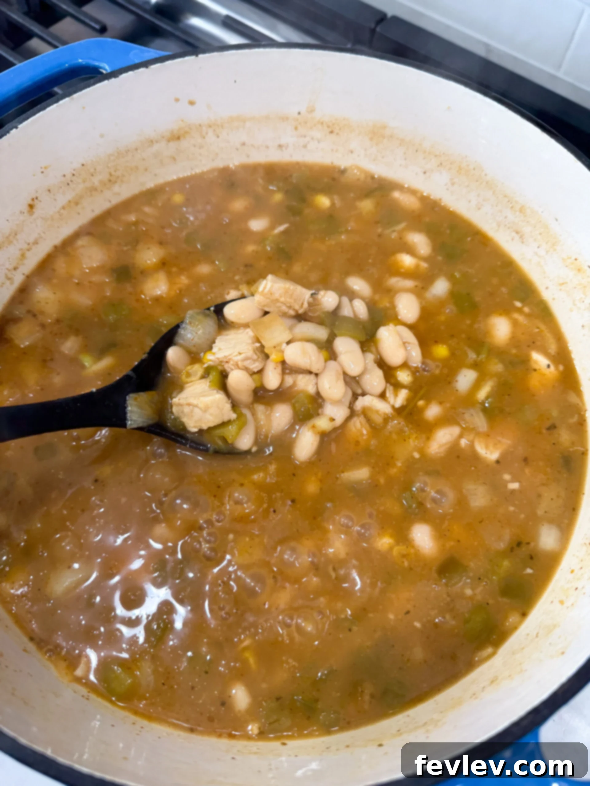 Simmering all chili ingredients together