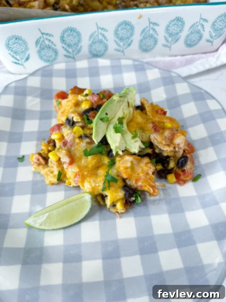 Cheesy Chicken Tortilla Bake 15 Close-up of baked Chicken Tortilla Casserole with melted, bubbly cheese