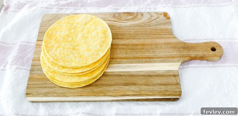 Cheesy Chicken Tortilla Bake 4 Step 1: Cutting corn tortillas into small squares