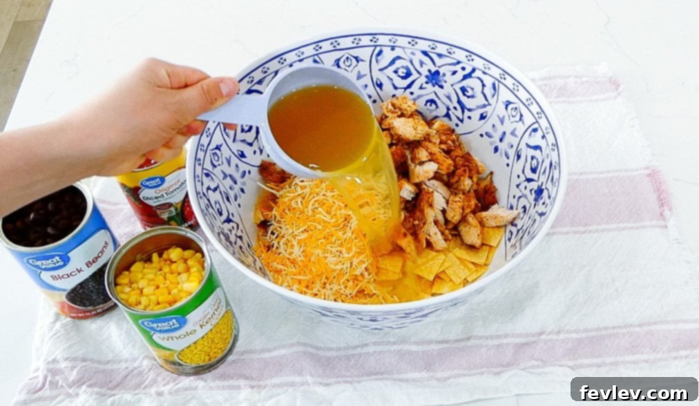 Cheesy Chicken Tortilla Bake 9 Prepping the casserole dish with nonstick spray