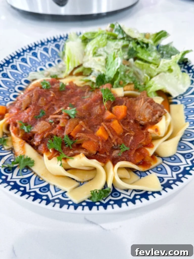 Hearty Slow Cooker Beef Ragu 11 close-up of slow cooker beef ragu on a plate