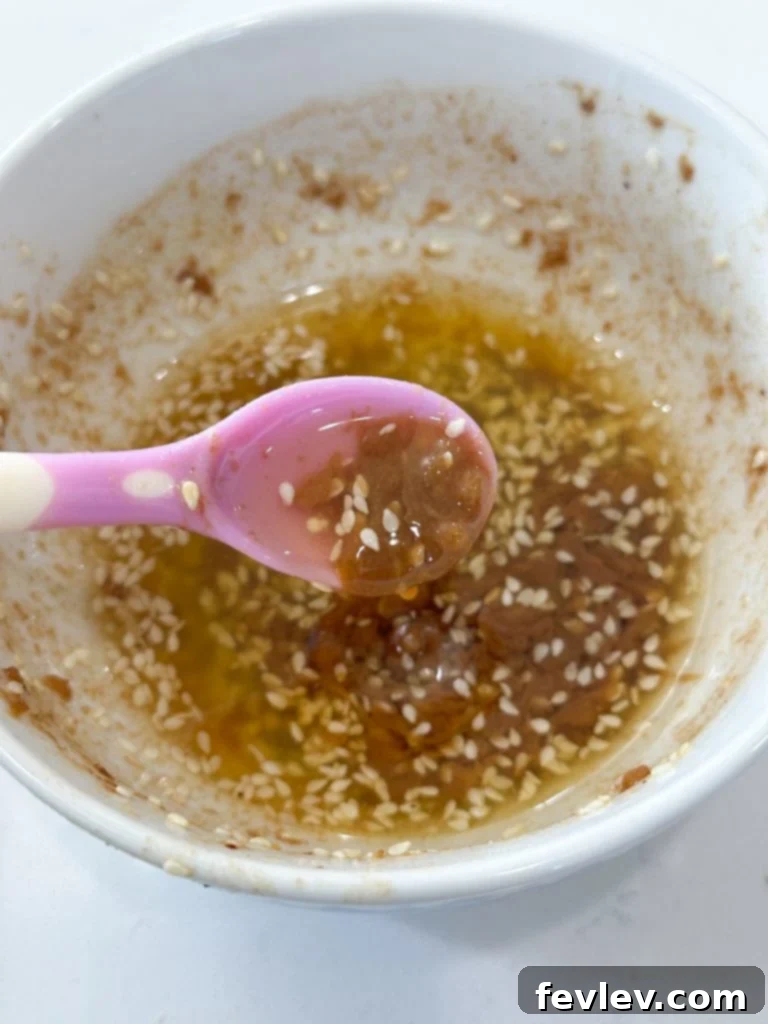 Mixing glaze ingredients in a small bowl