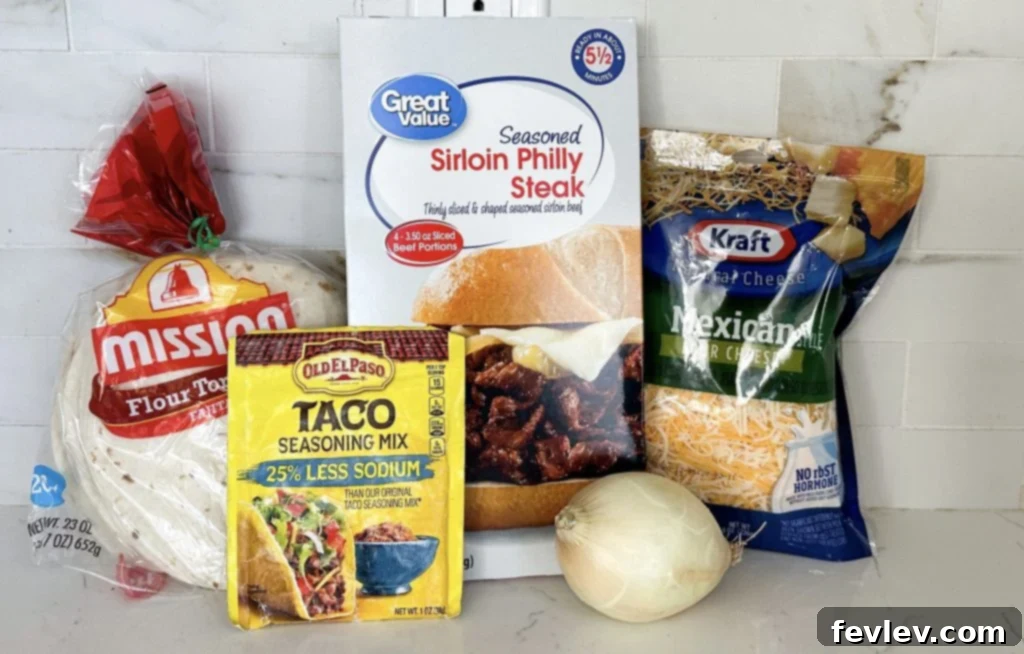 Ingredients for Steak Fajita Quesadillas laid out on a cutting board