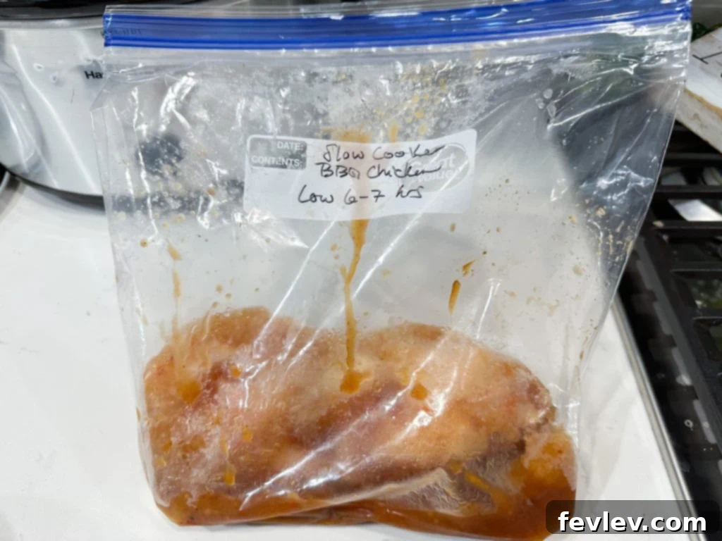 Ingredients for cheap freezer meals including chicken, BBQ sauce, and Italian dressing.