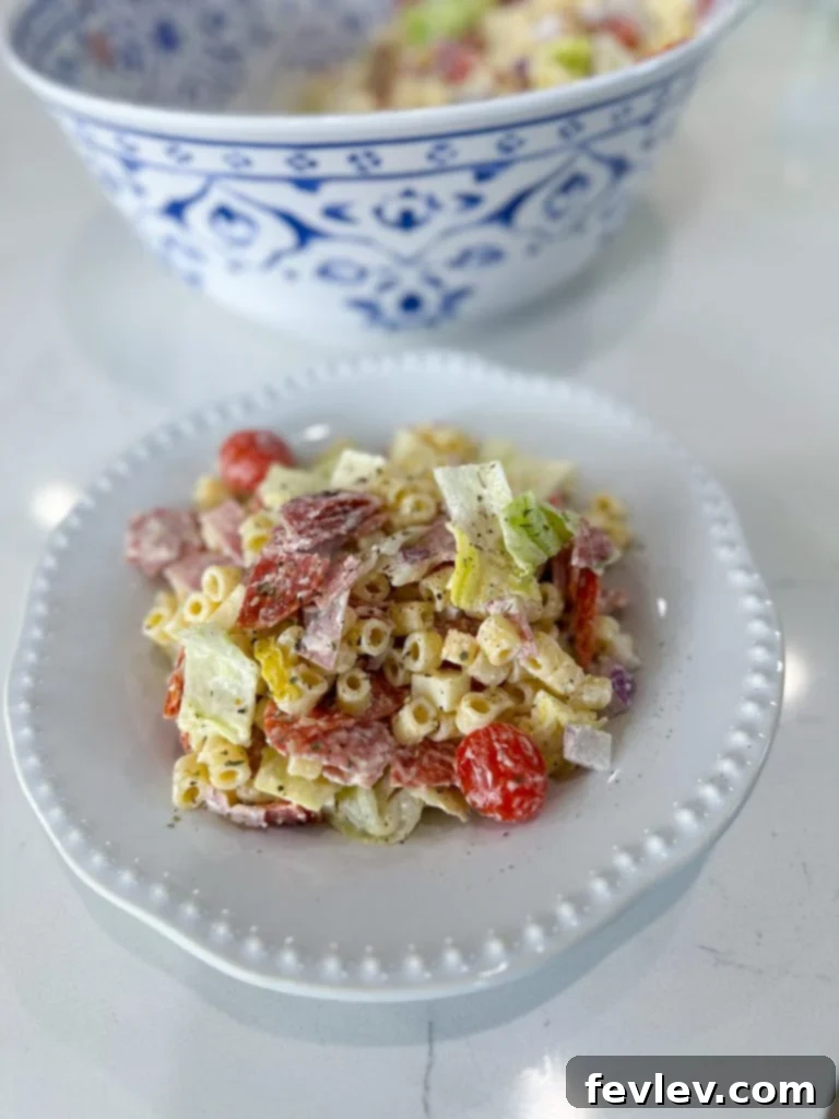 Loaded Italian Grinder Pasta Salad 8 A large serving bowl filled with the completed Italian Grinder Pasta Salad, ready to be enjoyed.