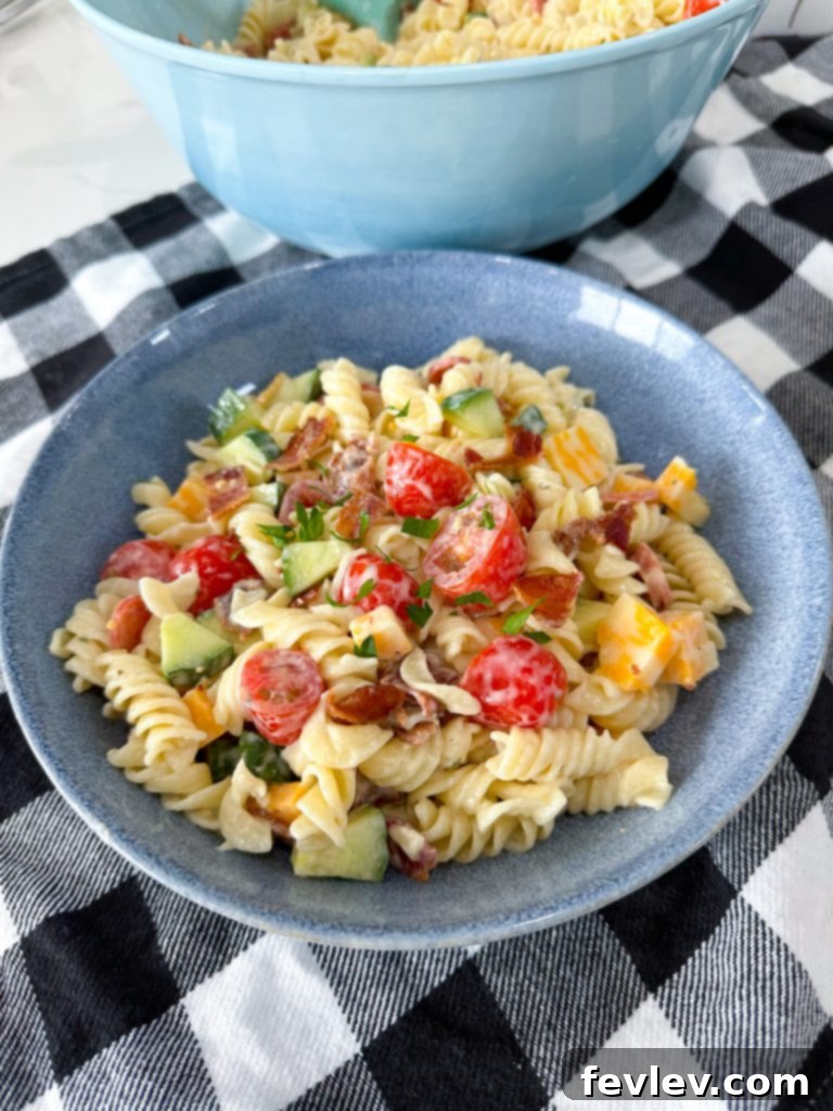 Ranch Kissed Italian Pasta Salad 8 The creamy Italian Ranch dressing, perfectly whisked and ready to coat the pasta salad ingredients, promising a burst of flavor.
