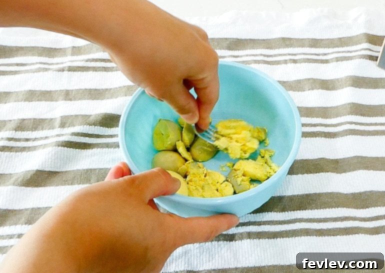 Egg yolks separated from whites in a small bowl.