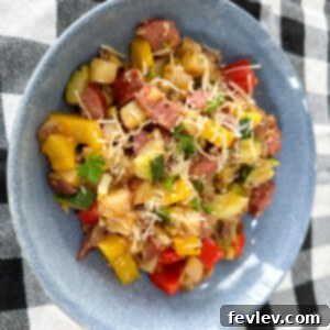 Delicious one-pan sausage and potatoes with vibrant summer vegetables