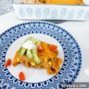 Delicious and cheesy Tamale Casserole ready to serve, garnished with fresh cilantro