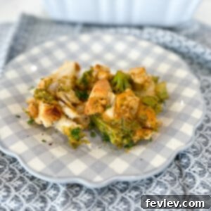 Delicious Chicken Cheese Bubble Up Casserole with golden biscuits