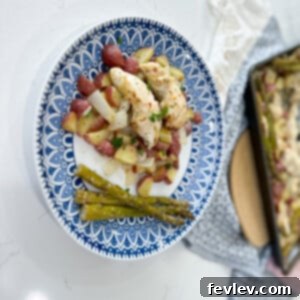 Crispy Sheet Pan Parmesan Garlic Chicken Tenders with Roasted Red Potatoes and Green Asparagus