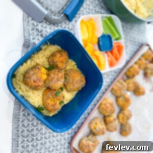 Delicious Sausage Balls served over a bed of creamy Cheddar Orzo