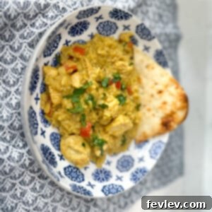 Delicious One Pot Chicken Curry with Rice, garnished with fresh cilantro