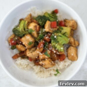 Effortless Chicken & Veggie Delight 6 Delicious Easy Chicken Vegetable Stir Fry plated with rice