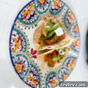 Delicious Slow Cooker Chicken Fajitas with vibrant bell peppers and tender chicken strips, ready to be served