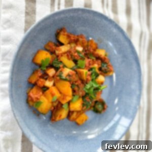 A vibrant skillet of perfectly cooked Chorizo and Potatoes, ready to be served