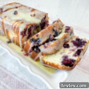 Delicious Blueberry Lemon Loaf Cake with a citrus glaze