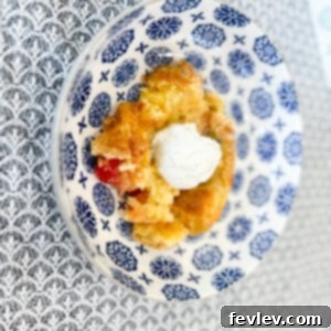 Delicious Pineapple Upside Down Cake with caramelized pineapple rings and cherries
