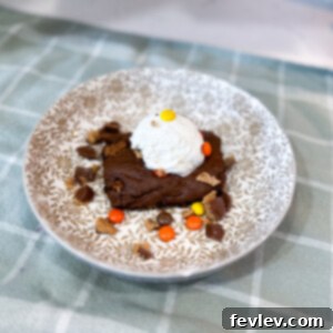 Delicious Reese's Cake with chocolate and peanut butter candies