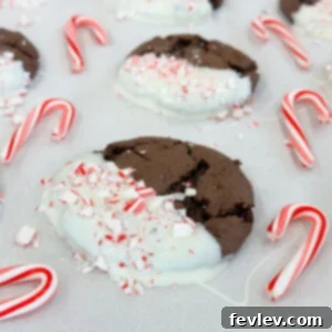 Delicious White Chocolate Dipped Cookies with festive crushed candy cane topping, perfect for holidays