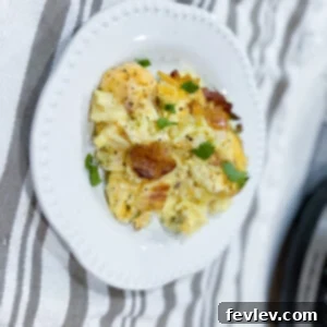 Delicious and hearty Slow Cooker Bacon Egg Casserole, a perfect make-ahead breakfast with crispy bacon and fluffy eggs