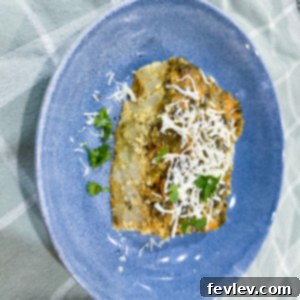Delicious Slow Cooker Spinach Egg Casserole ready to serve, garnished with fresh herbs