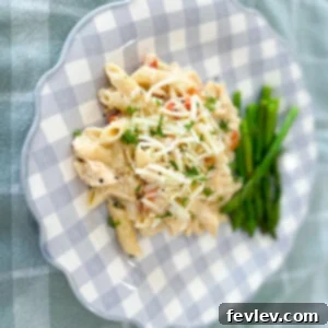Delicious Cheesy Pasta and Chicken dish, garnished and ready to serve
