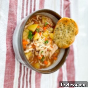 Tuscan Chicken and Potato Stew, a hearty and flavorful slow cooker meal