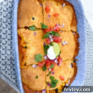Delicious Chicken Enchilada Cornbread Casserole with a golden, baked cornbread topping and rich chicken filling