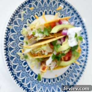 Delicious and easy chicken tacos with fresh toppings