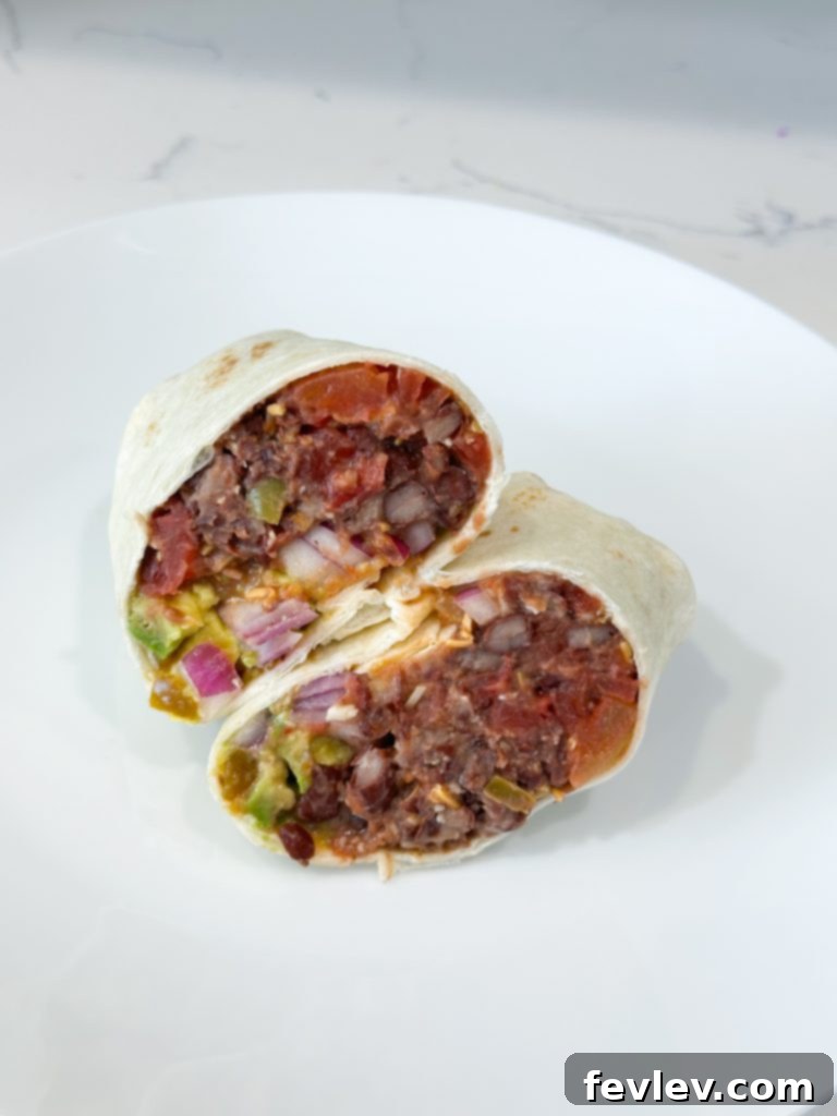 Black Bean Fiesta Burritos 6 Variety of black bean burrito toppings laid out, like rice, cilantro, and hot sauce