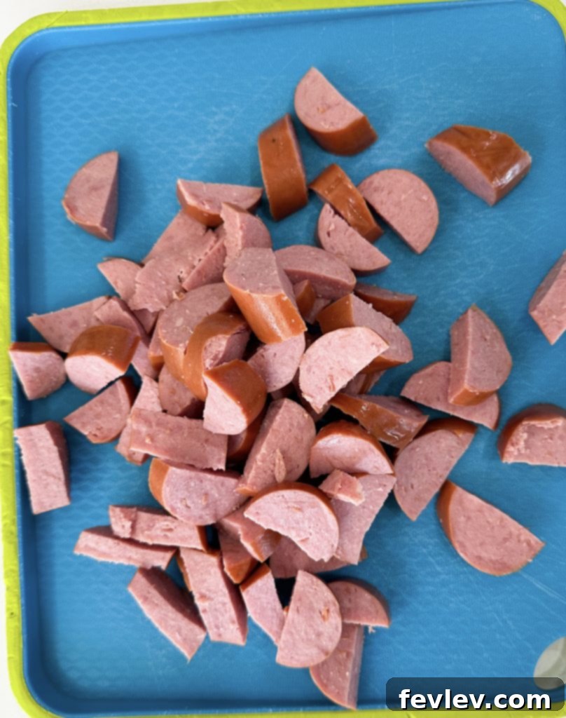 Smoked Sausage Mac and Cheese: A Five Dollar Feast 4 Slicing smoked sausage into half moons