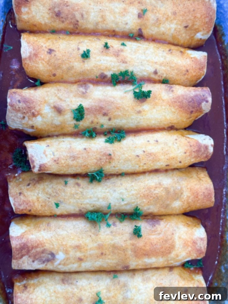 Baked bean and rice enchiladas before adding sauce