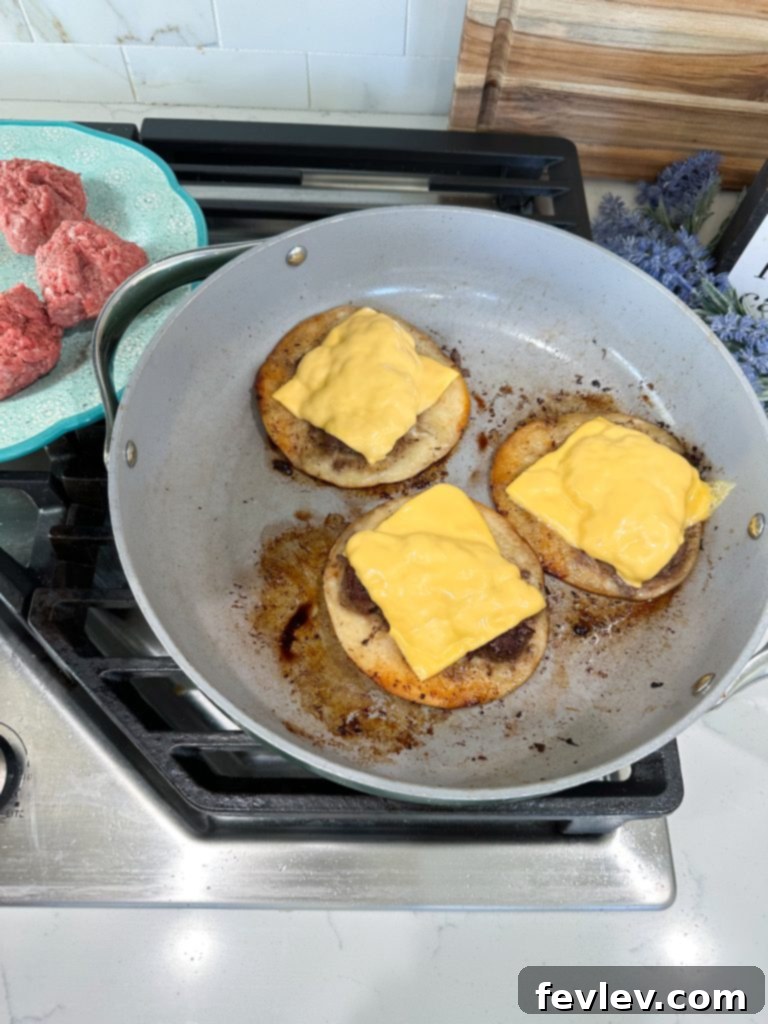 Assembled hamburger tacos with toppings
