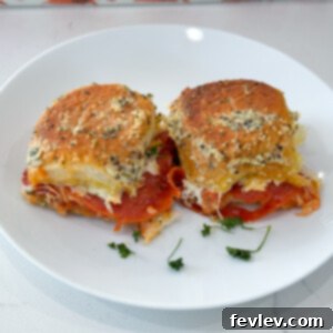 Final baked pizza sliders with a golden-brown crust and melted cheese, ready to be served