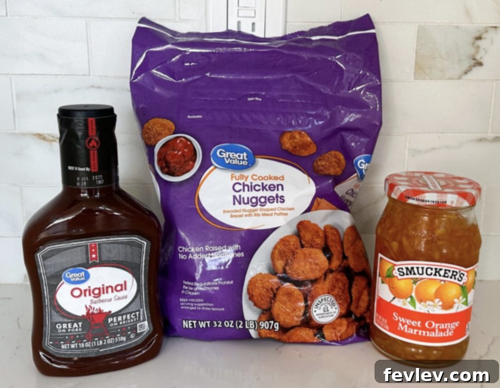 Key ingredients for 3-ingredient orange chicken: frozen nuggets, orange marmalade, BBQ sauce, soy sauce