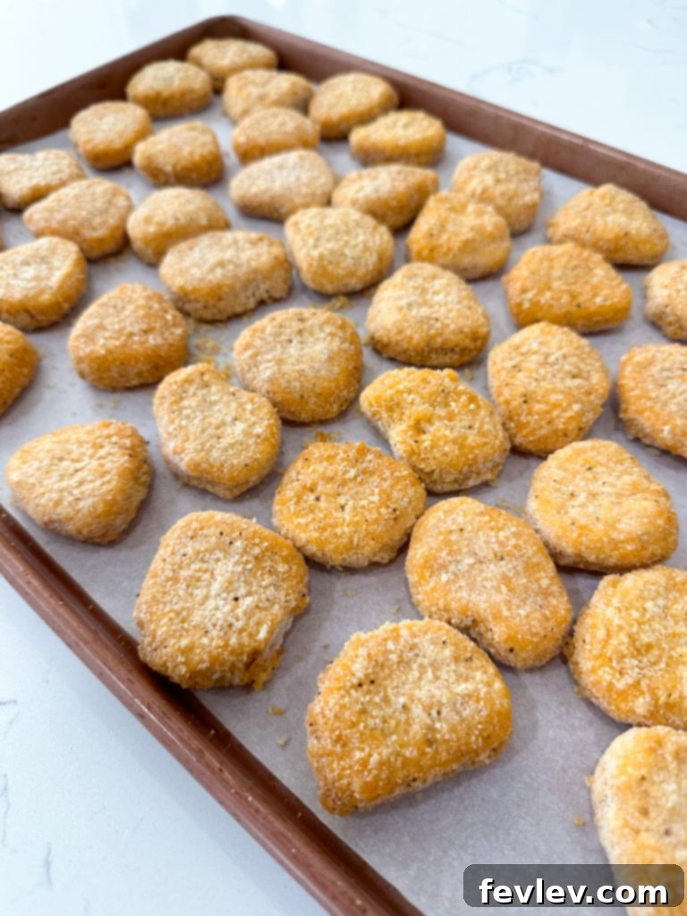 Crispy frozen chicken nuggets ready for orange sauce