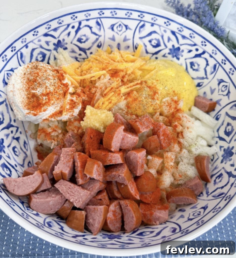 Dump and Go Sausage Hashbrown Casserole in a mixing bowl