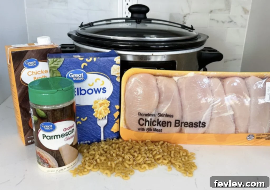 Comforting Slow Cooker Italian Chicken Noodle Soup 2 Fresh ingredients laid out for slow cooker Italian chicken noodle soup, including vegetables and herbs.