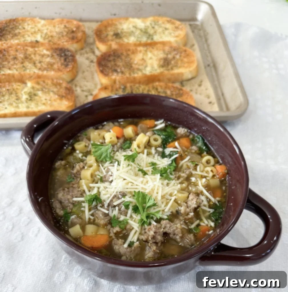 Portion of One-Pot Italian Sausage Soup stored in an airtight container for the fridge
