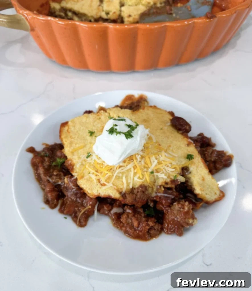 20 Easy 5 Ingredient Casseroles for Quick and Delicious Dinners 5 Comforting Chili Pot Pie Casserole topped with golden corn muffin mix