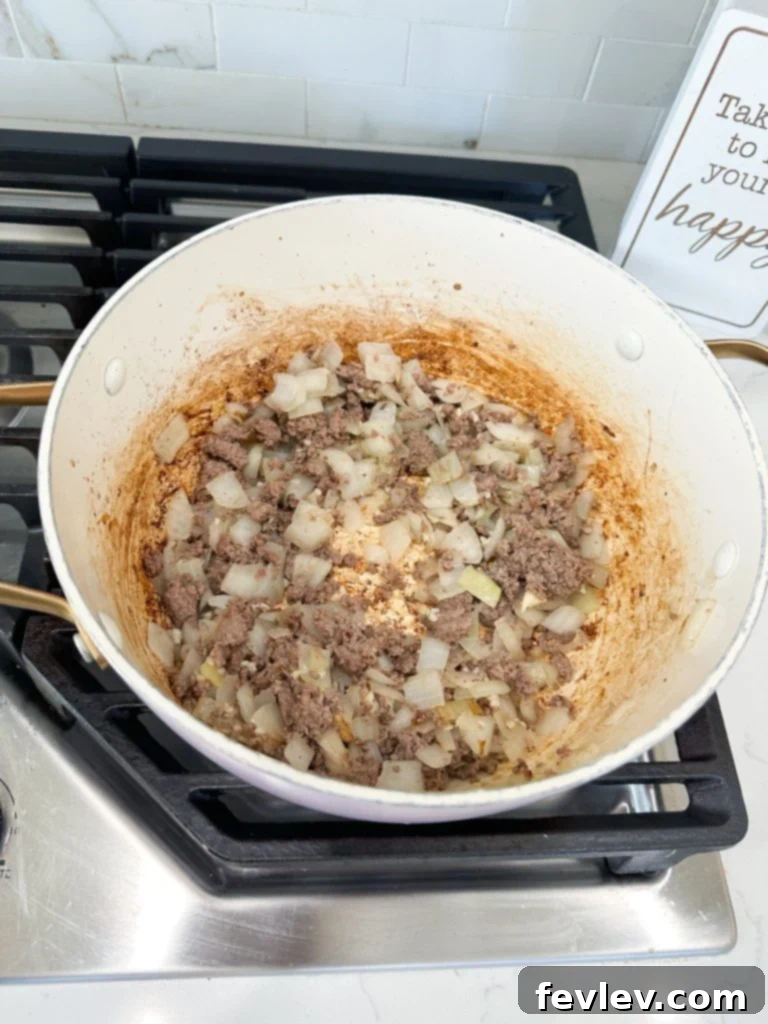 Preparing the hash browns for Cheeseburger Hash Brown Casserole