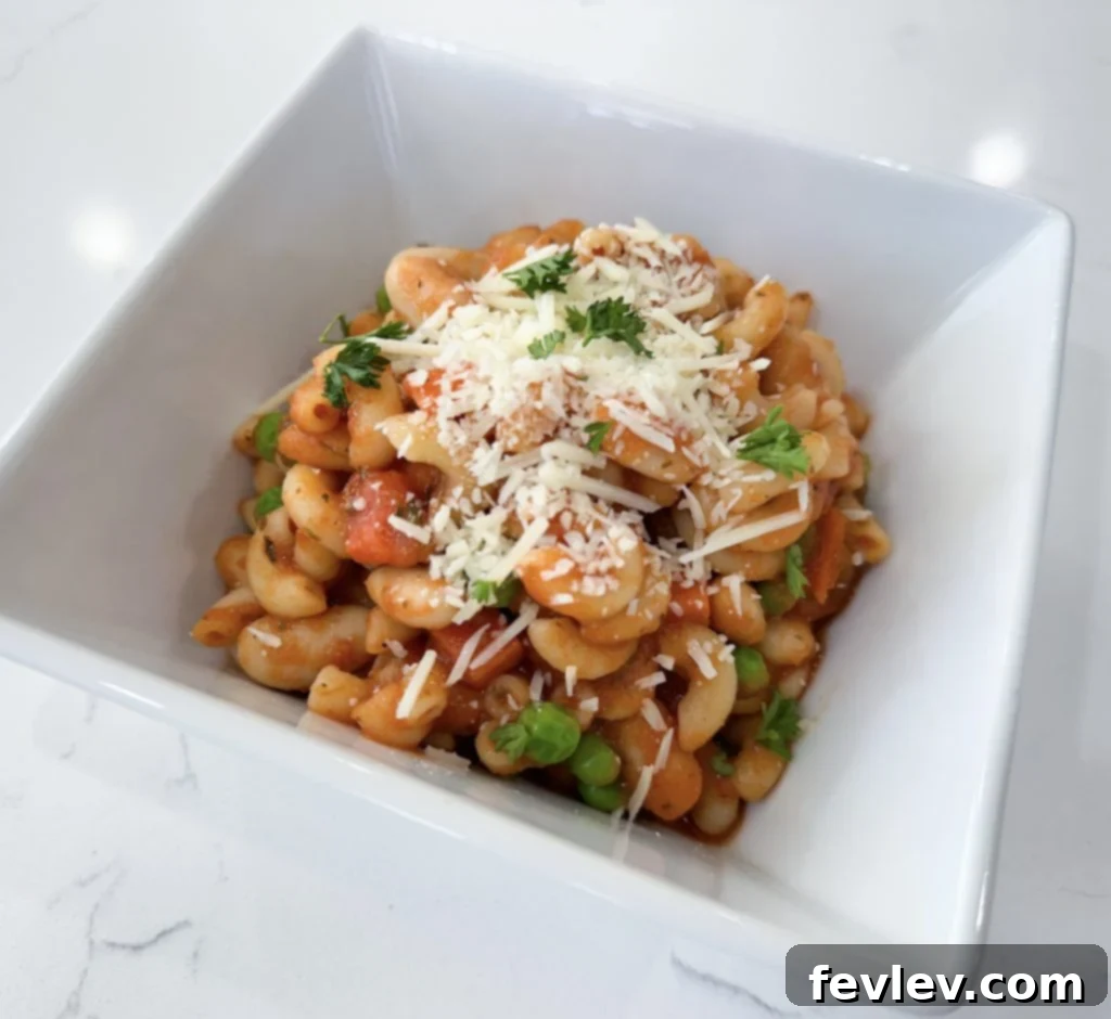 A close-up of the cooked pasta with beans dish, highlighting the texture of the beans and pasta in the sauce.