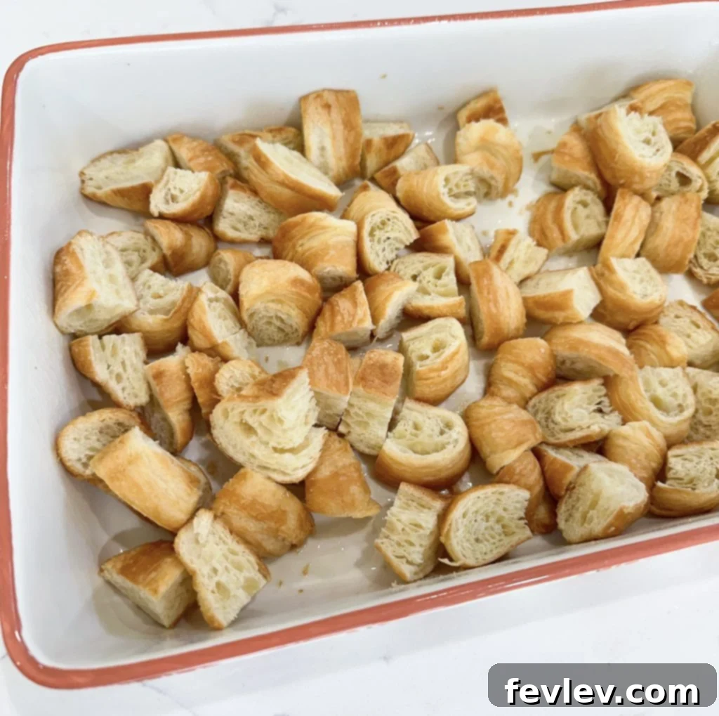 Croissant pieces ready for baking in the Dump and Bake Chocolate Crescent Casserole
