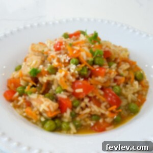 One Pot Teriyaki Chicken and Rice, garnished and ready to serve.